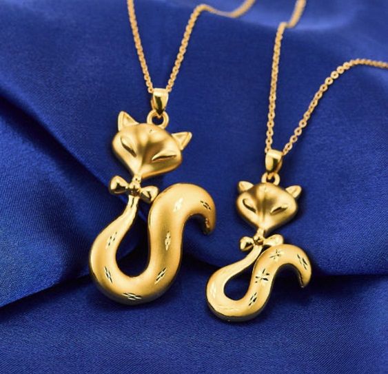 黃金吊墜多少錢_黃金吊墜錢袋子有什么意義嗎_黃金吊墜錢袋子真的假的